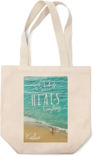 Lantern Press Kailua, Hawaii, Surfer Walking on Beach, Ocean Water Heals Everything (100% Cotton Canvas Reusable Tote Bag)